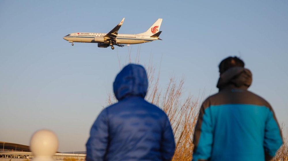 Covid in China: People rush to book travel as borders finally reopen